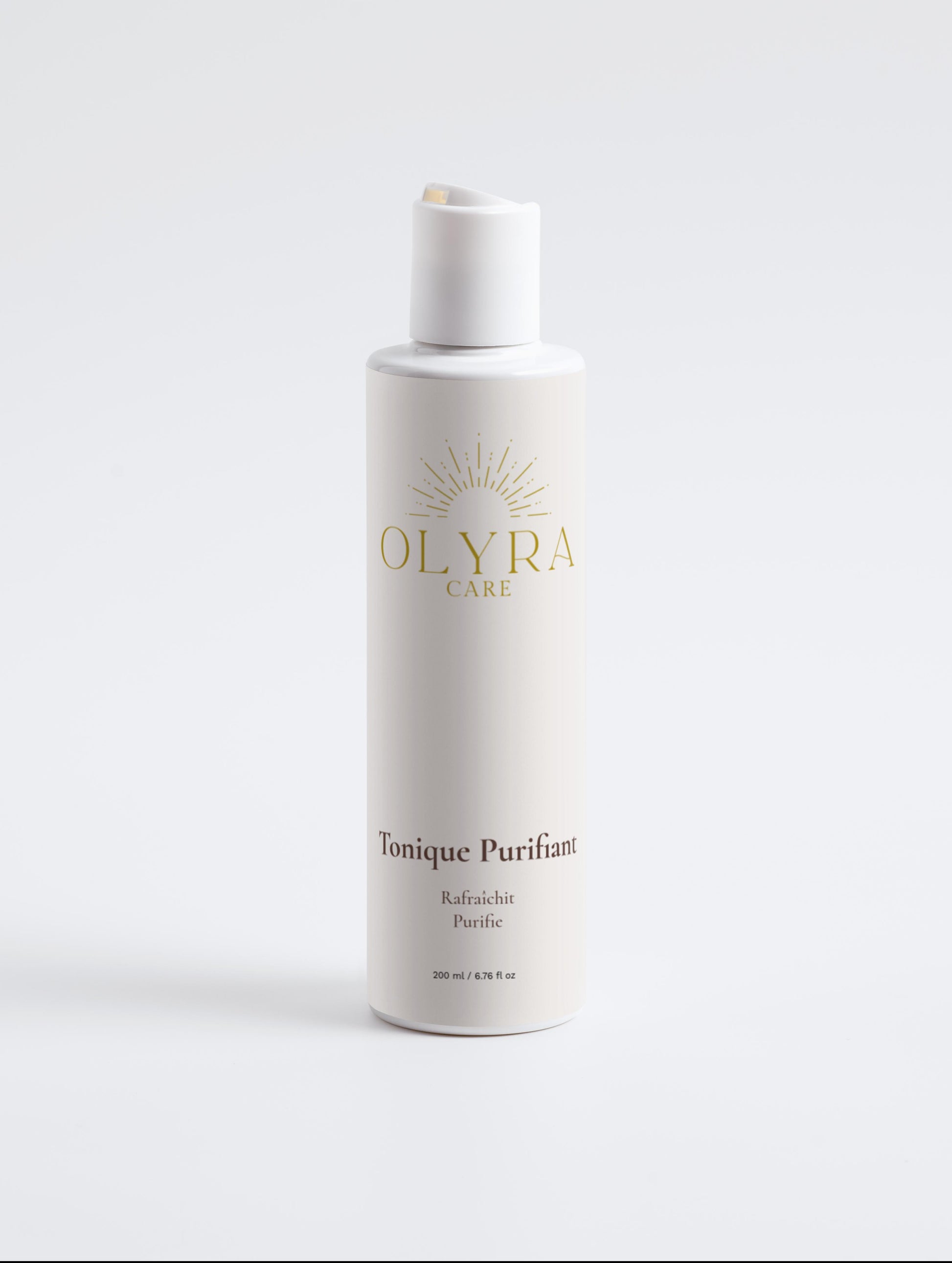 Flacon de Tonique Purifiant Olyra Care, un tonique purifiant pour peau équilibrée et rafraîchie.